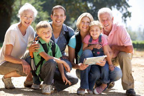 a family smiling after a routine dental treatment for family in Columbia, Md